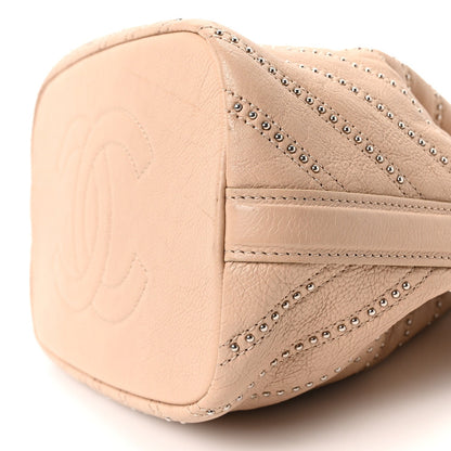 Metallic Calfskin Studded Chevron Quilted Small Stud Wars Drawstring Bag Beige