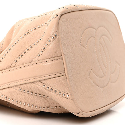 Metallic Calfskin Studded Chevron Quilted Small Stud Wars Drawstring Bag Beige