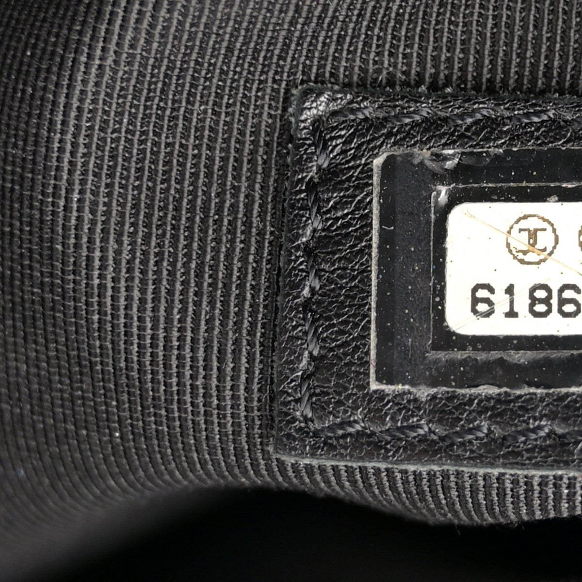 Caviar Quilted Bowler Black