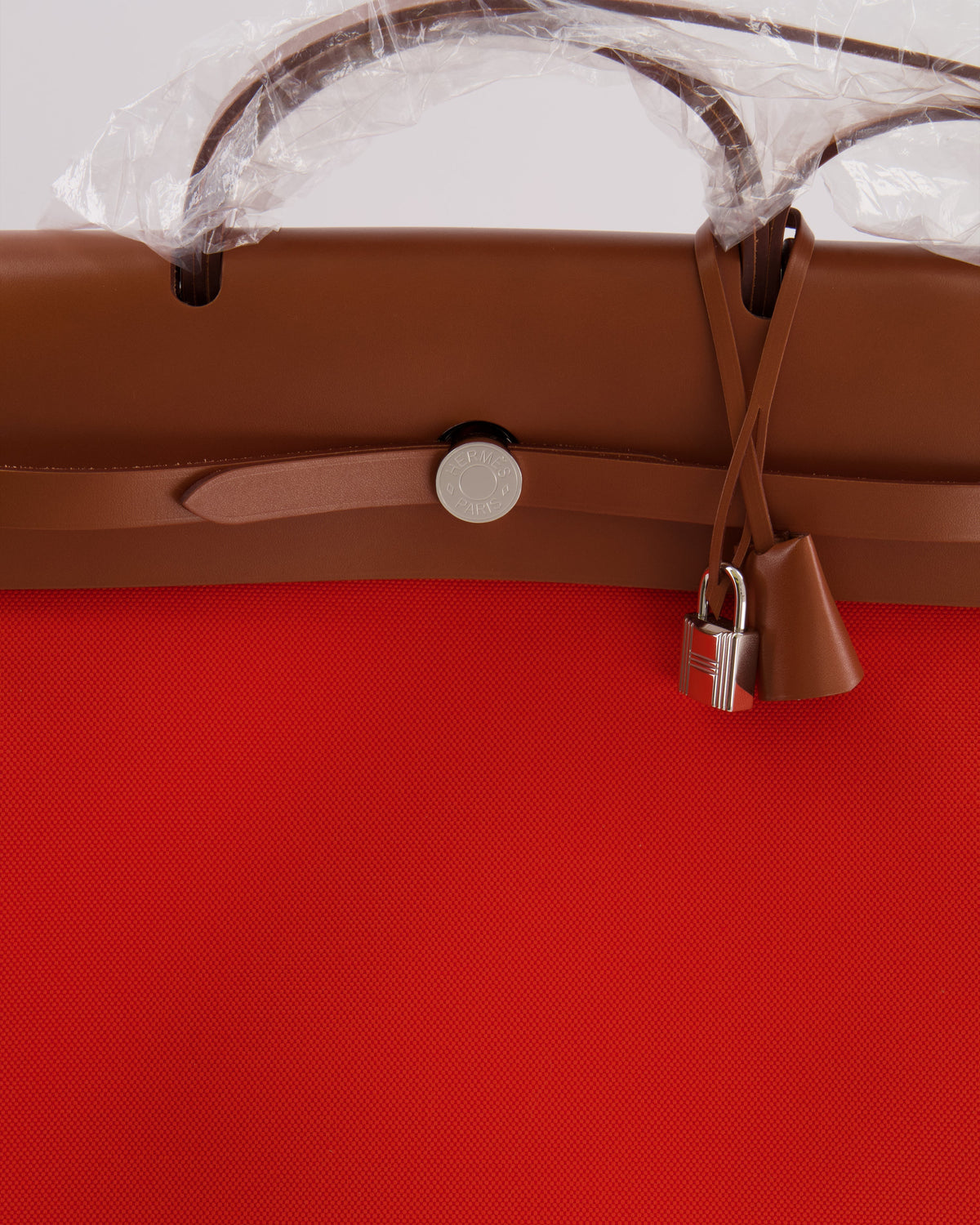 Hermès Herbag 39 in Orange Mecano Toile Canvas and Fauve Vache Hunter Leather with Palladium Hardware