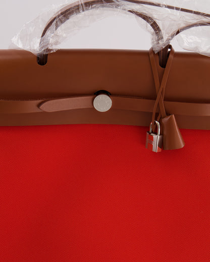 Hermès Herbag 39 in Orange Mecano Toile Canvas and Fauve Vache Hunter Leather with Palladium Hardware