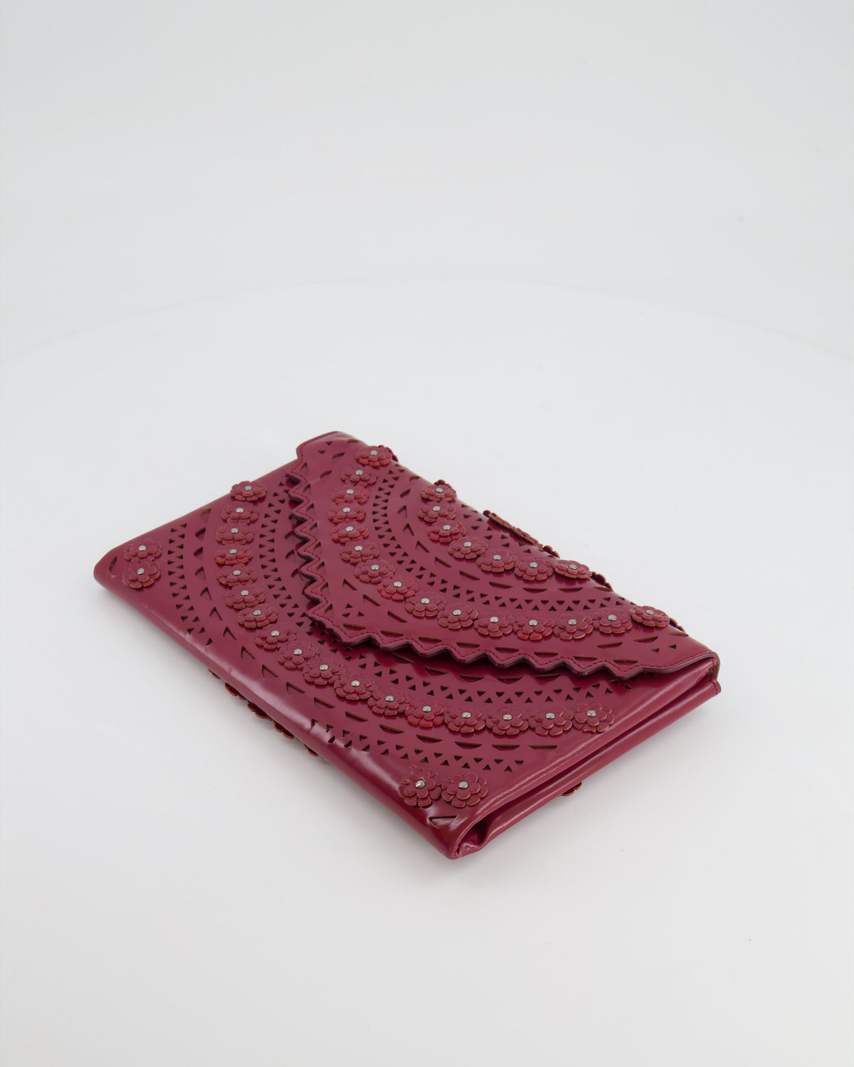 Alaïa Burgundy Patent Leather Floral Oum Clutch Bag with Silver Hardware RRP £2,200