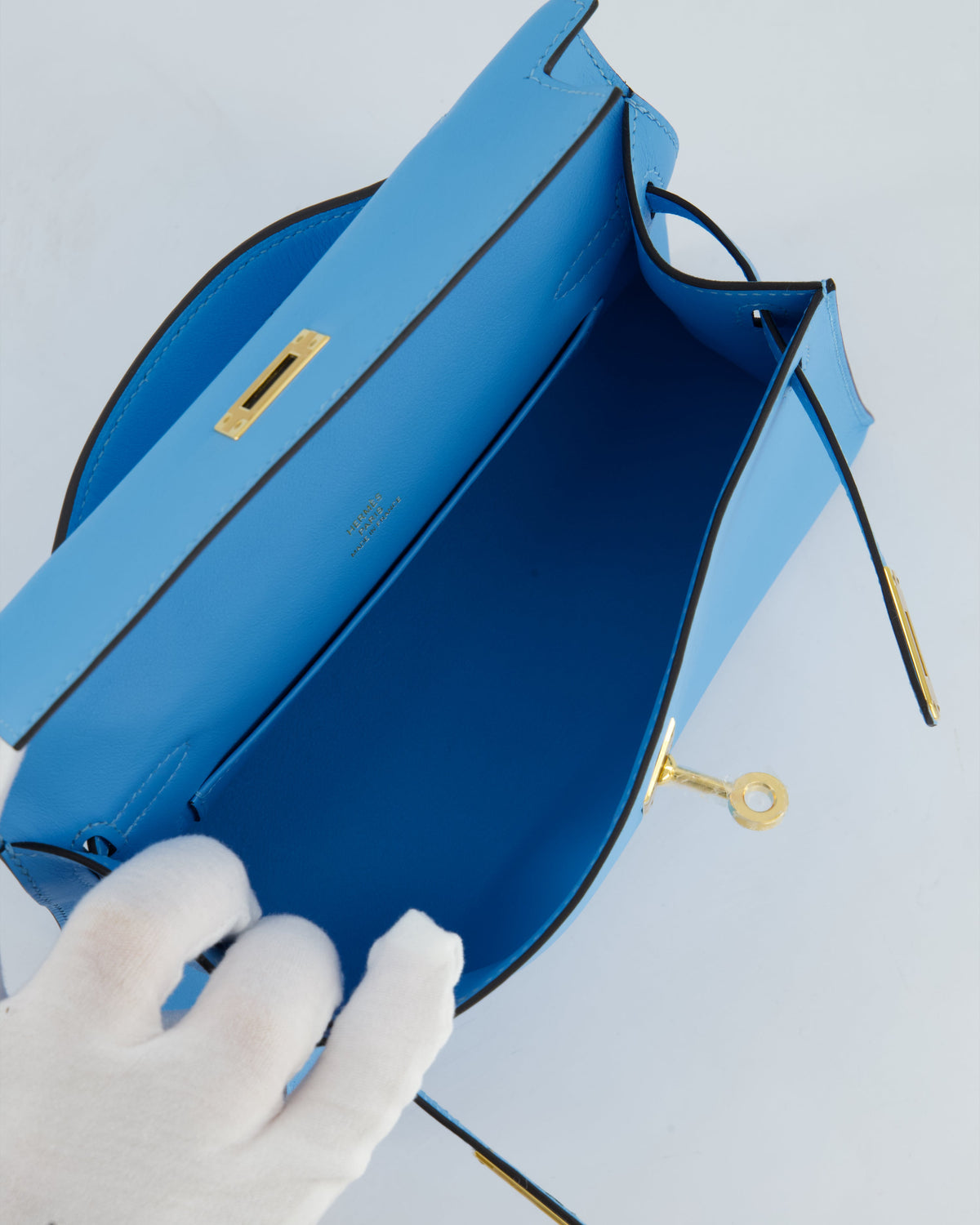 Hermès Kelly Pochette Bag in Bleu Celeste Swift Leather with Gold Hardware