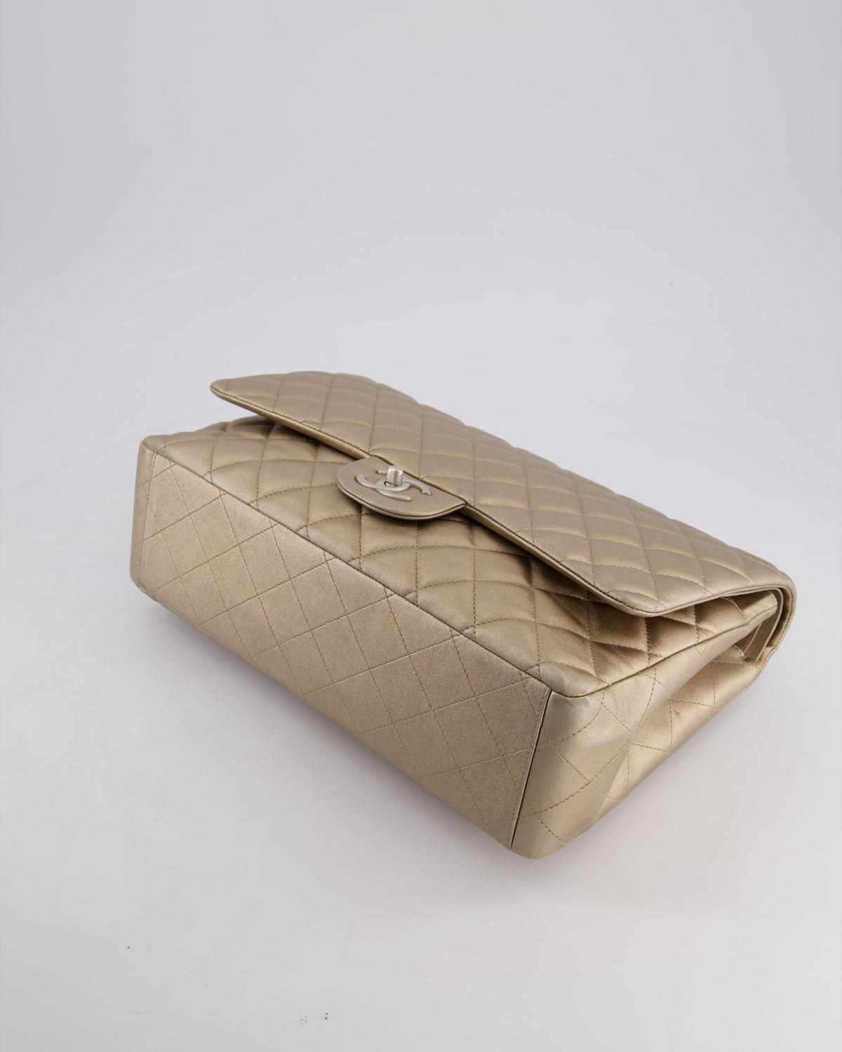 Chanel Metallic Gold Maxi Classic Double Flap Bag in Calfskin Leather with Brushed Silver Hardware
