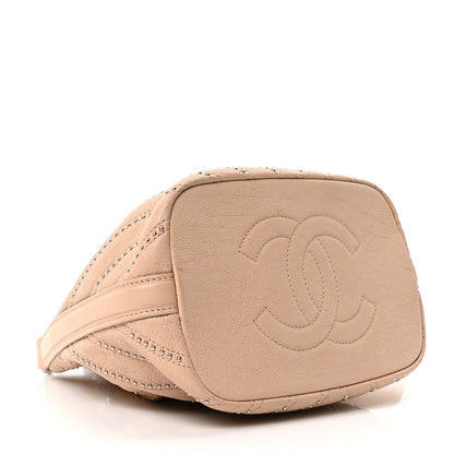 Metallic Calfskin Studded Chevron Quilted Small Stud Wars Drawstring Bag Beige