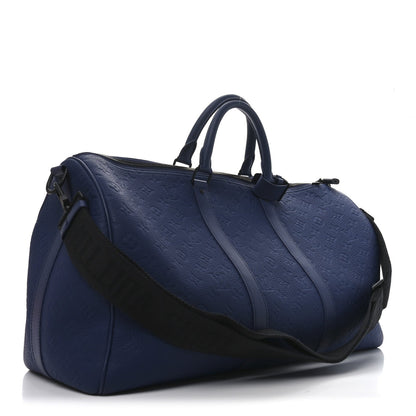 Embossed Calfskin Monogram Shadow Keepall Bandouliere 50 Navy Blue