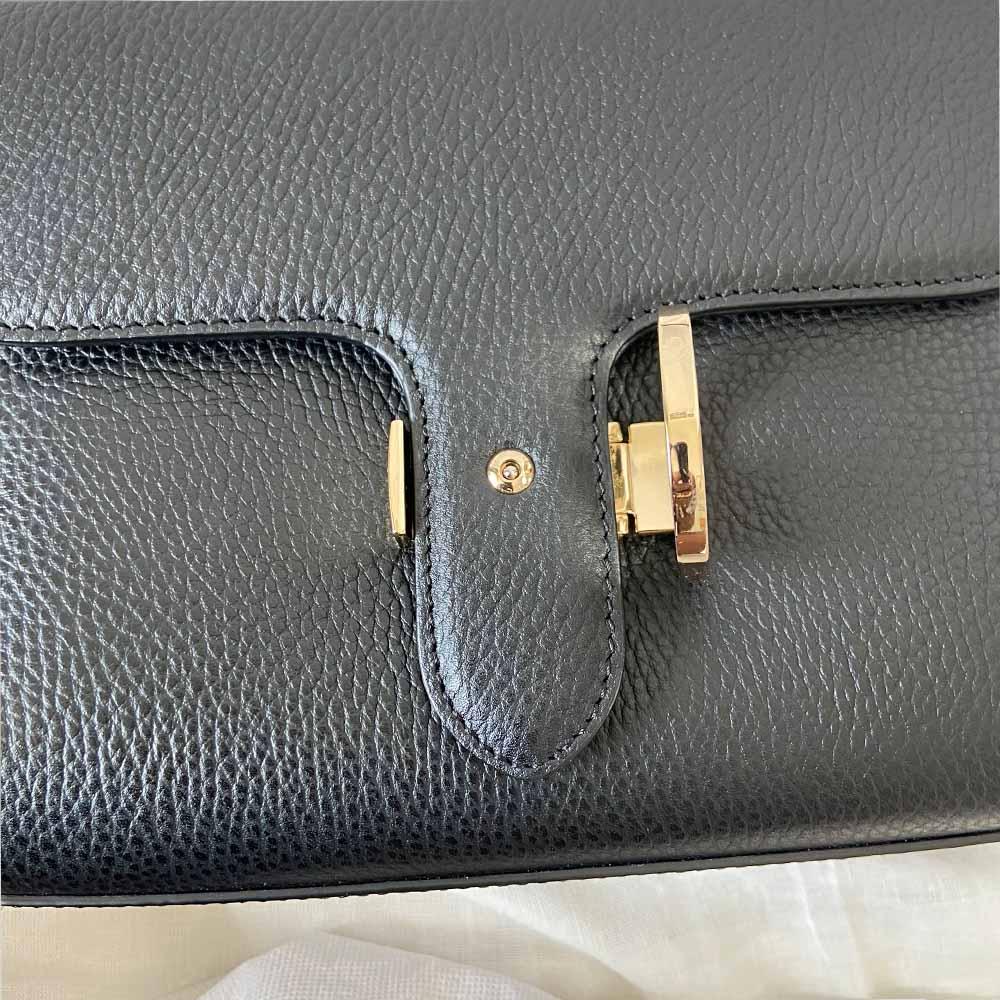 Gucci interlocking G black leather flap bag with goldtone hardware