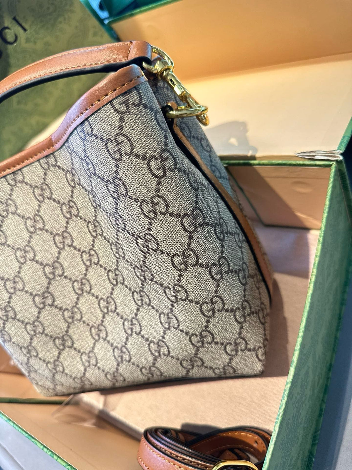 GUCCI GG Emblem mini bucket bag